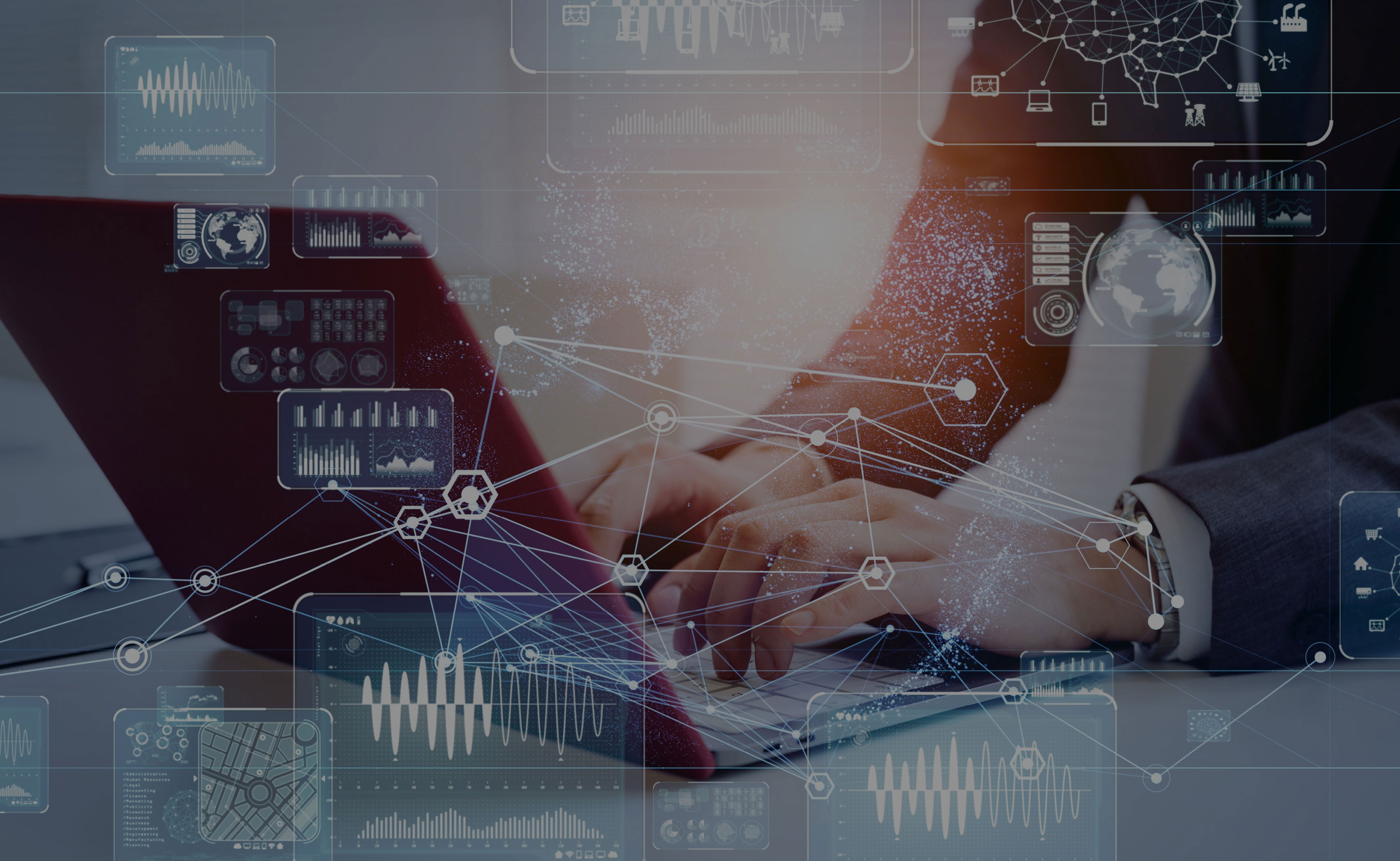 hands typing on laptop with overlay of abstract data 
