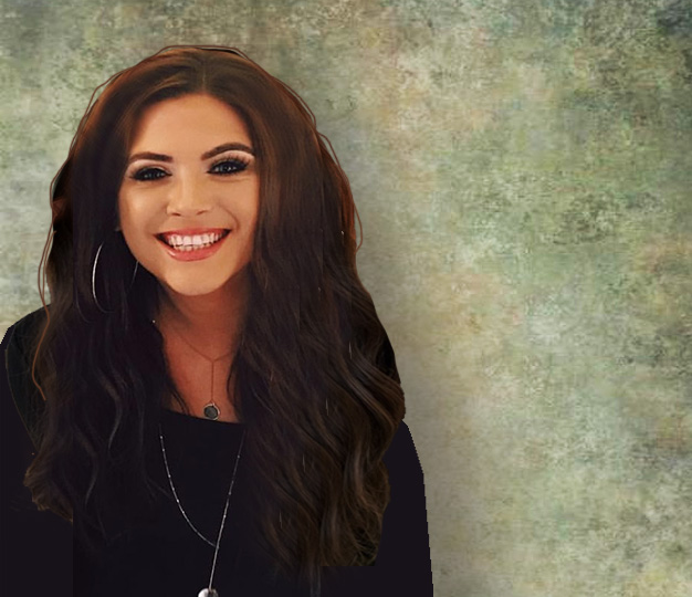 portrait of kelly culter, a woman with long dark brown hair, smiling against a mottled grey background